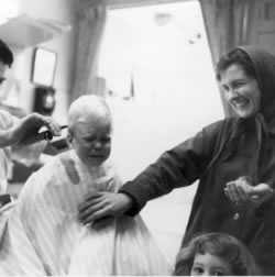 Jim's first haircut (Kathy lower right), 1961.