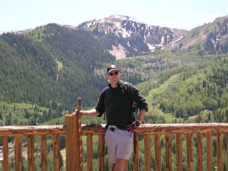 Jim overlooking The Canyons (above condo), with peak Ninety-Nine 90 in background.