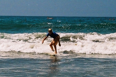 Nate rides out the shore break.